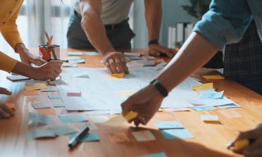 image of people at a table planning